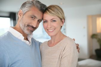 Smiling middle aged couple