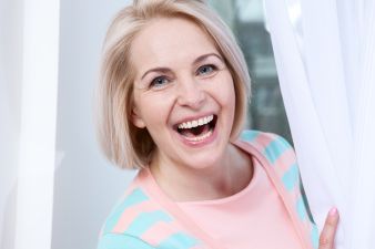 laughing mature blonde