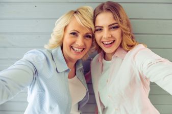 Mother And Daughter laughing