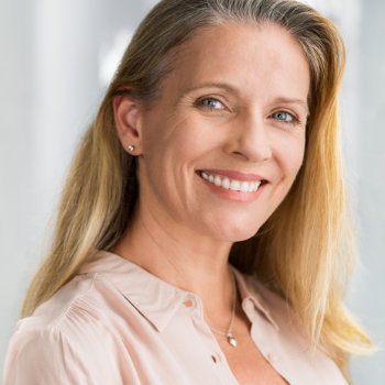 Portrait of mature woman Elegant Smiles patient care