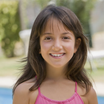 Smiling Hispanic girl Pediatric Dentistry Roswell care visit