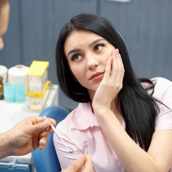 Dental visit woman in chair Elegant Smiles care