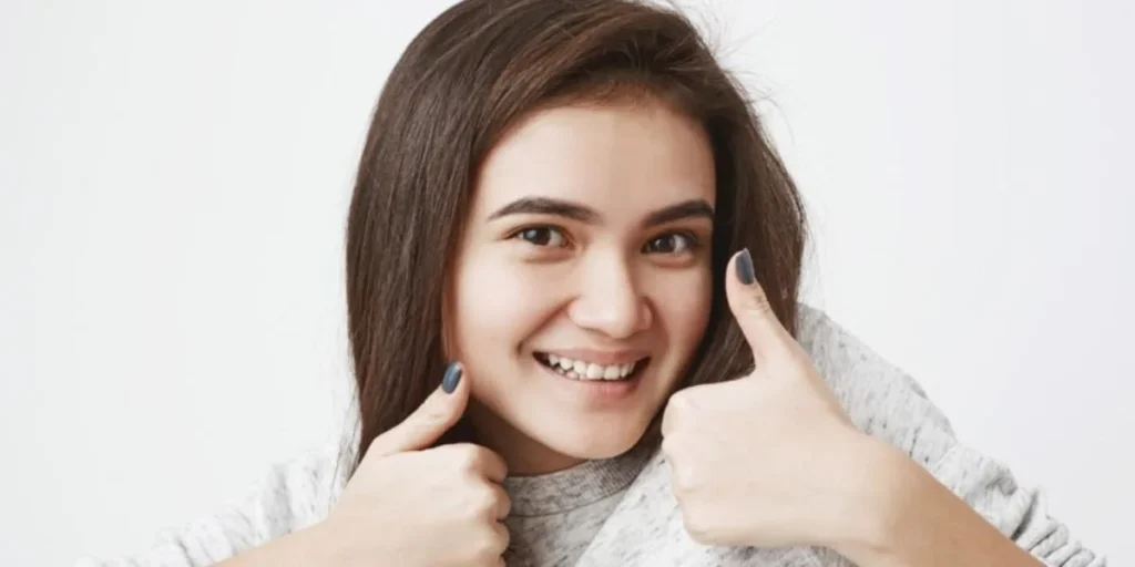 Best whitening for sensitive teeth smiling woman